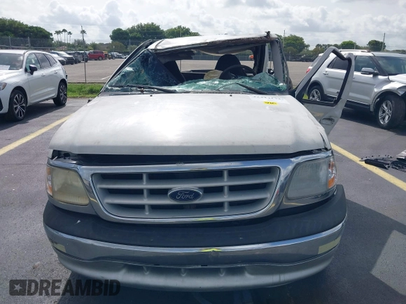 1999 Ford F-150 with VIN 1FTRX17W6XNB65695, listed as a IAAI auction lot 42444132 with Not provided miles and . Bid and sale history available at DreamBid. Image 13.