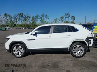 2021 Volkswagen Atlas SEL z VIN 1V2EE2CA2MC227667, wystawiony jako IAAI lot #41886405 z przebiegiem 41 928 mil mil oraz . Historia ofert i sprzedaży dostępna na DreamBid. Obrazek 15.