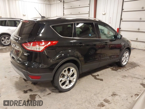 2014 Ford Escape Titanium with VIN 1FMCU9J95EUD85537, listed as a IAAI auction lot 41472236 with 154,796 mi miles. Bid and sale history available at carsss.com. Image 4.