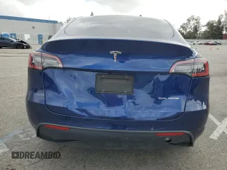 2021 Tesla Model Y Long Range with VIN 5YJYGDEE2MF207913, listed as a Copart auction lot 54385605 with 46,056 mi miles and Salvage Title. Bid and sale history available at DreamBid. Image 6.