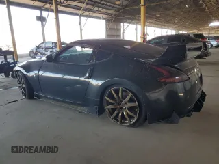 2009 Nissan 370Z z VIN JN1AZ44E19M411715, wystawiony jako Copart lot #56654815 z przebiegiem 123 791 mil mil oraz Szkoda całkowita • Salvage title. Historia ofert i sprzedaży dostępna na DreamBid. Obrazek 2.
