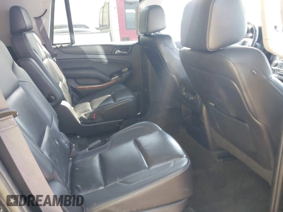 2015 Chevrolet Tahoe LTZ z VIN 1GNSKCKC8FR141163, wystawiony jako IAAI lot #42114008 z przebiegiem 221 804 mil mil oraz . Historia ofert i sprzedaży dostępna na DreamBid. Obrazek 8.