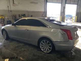 2015 Cadillac ATS Coupe Luxury AWD with VIN 1G6AH1RX4F0113934, listed as a Copart auction lot 84439094 with 56,679 mi miles and Salvage Title. Bid and sale history available at carsss.com. Image 2.