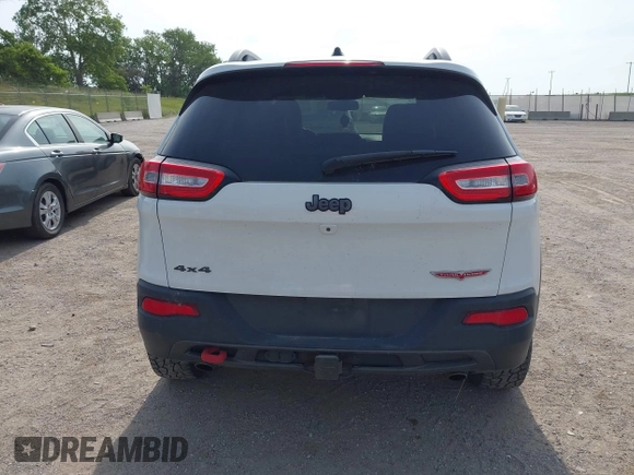 2015 Jeep Cherokee Trailhawk with VIN 1C4PJMBS6FW687718, listed as a IAAI auction lot 42505169 with 122,526 mi miles and . Bid and sale history available at DreamBid. Image 17.