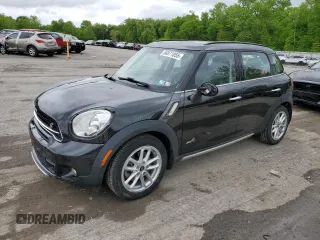 2015 MINI Countryman S z VIN WMWZC5C58FWP45276, wystawiony jako Copart lot #56871055 z przebiegiem 74 140 mil mil oraz Szkoda całkowita • Salvage title. Historia ofert i sprzedaży dostępna na DreamBid. Obrazek 1.