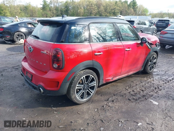 2014 MINI Countryman S with VIN WMWZC3C52EWP29433, listed as a IAAI auction lot 42179585 with 179,871 mi miles and . Bid and sale history available at DreamBid. Image 4.
