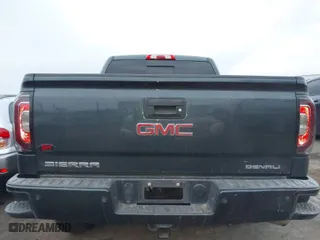 2018 GMC Sierra 1500 Denali with VIN 3GTU2PEJ8JG571593, listed as a IAAI auction lot 41169420 with 98,501 mi miles. Bid and sale history available at carsss.com. Image 16.