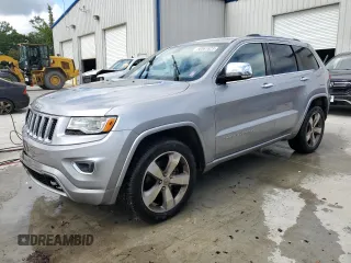 2015 Jeep Grand Cherokee Overland z VIN 1C4RJFCT3FC941270, wystawiony jako Copart lot #58061625 z przebiegiem 149 579 mil mil oraz Szkoda całkowita • Salvage title. Historia ofert i sprzedaży dostępna na DreamBid. Obrazek 1.