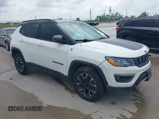 2020 Jeep Compass Trailhawk with VIN 3C4NJDDB3LT118928, listed as a IAAI auction lot 42128120 with 95,477 mi miles and . Bid and sale history available at DreamBid. Image 1.