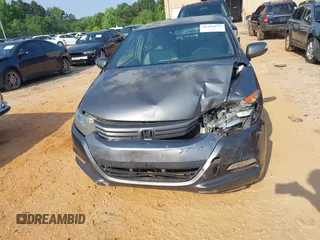 2010 Honda Insight EX with VIN JHMZE2H74AS027020, listed as a IAAI auction lot 42394875 with 248,003 mi miles and . Bid and sale history available at DreamBid. Image 12.