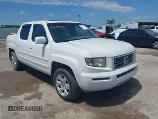2007 Honda Ridgeline RTL w/Leather with VIN 2HJYK16537H527957, listed as a IAAI auction lot 42098143 with 233,163 mi miles. Bid and sale history available at carsss.com. Image 1.