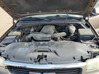2003 GMC Yukon SLT with VIN 1GKEK13Z43R219290, listed as a Copart auction lot 69303144 with 299,023 mi miles and Salvage Title. Bid and sale history available at carsss.com. Image 12.
