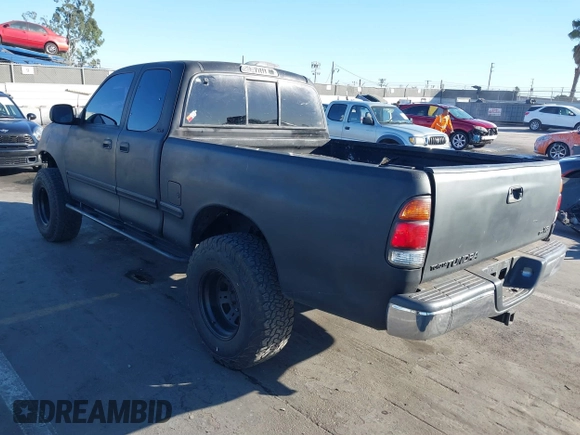 2000 Toyota Tundra SR5 with VIN 5TBRT3419YS114034, listed as a IAAI auction lot 41284071 with 200,797 mi miles and . Bid and sale history available at DreamBid. Image 3.