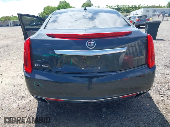2013 Cadillac XTS Luxury z VIN 2G61R5S33D9101434, wystawiony jako IAAI lot #42290199 z przebiegiem 48 075 mil mil oraz . Historia ofert i sprzedaży dostępna na DreamBid. Obrazek 6.
