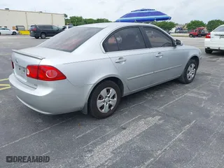 2007 Kia Optima LX with VIN KNAGE123175135348, listed as a IAAI auction lot 41887004 with 149,094 mi miles. Bid and sale history available at carsss.com. Image 4.
