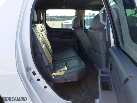 2013 Honda Ridgeline RTL with VIN 5FPYK1F58DB015799, listed as a IAAI auction lot 41498052 with 104,372 mi miles. Bid and sale history available at carsss.com. Image 8.