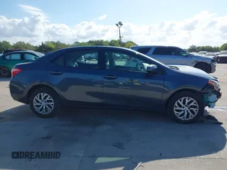 2019 Toyota Corolla L z VIN 2T1BURHE7KC183584, wystawiony jako IAAI lot #41908235 z przebiegiem 110 845 mil mil oraz . Historia ofert i sprzedaży dostępna na DreamBid. Obrazek 14.