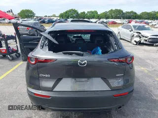 2021 Mazda CX-30 Preferred with VIN 3MVDMACLXMM228431, listed as a IAAI auction lot 41575602 with 67,854 mi miles. Bid and sale history available at carsss.com. Image 21.