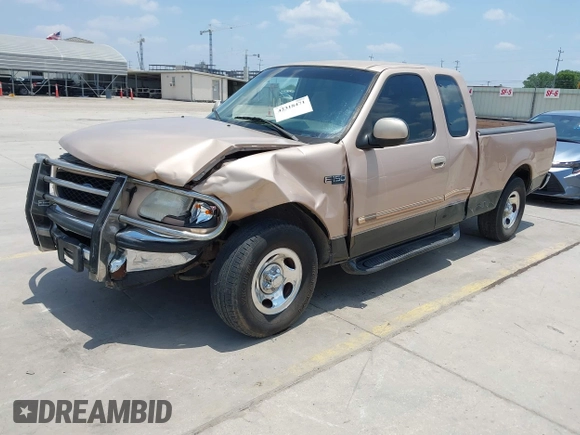 1997 Ford F-150 with VIN 1FTDX1769VNB04591, listed as a IAAI auction lot 42318471 with 202,860 mi miles and . Bid and sale history available at DreamBid. Image 2.