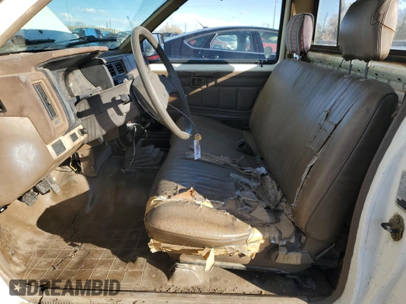 1987 Nissan Hardbody E z VIN JN6ND11S4HW011430, wystawiony jako Copart lot #81785214 z przebiegiem 334 566 mil mil oraz Tytuł czysty. Historia ofert i sprzedaży dostępna na DreamBid. Obrazek 7.