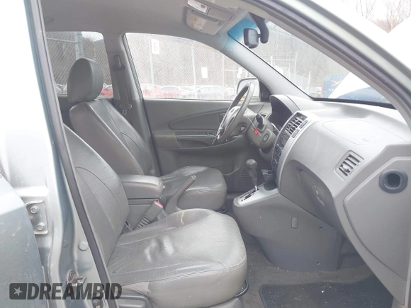 2007 Hyundai Tucson SE with VIN KM8JN12D27U606152, listed as a IAAI auction lot 41465051 with 141,478 mi miles. Bid and sale history available at carsss.com. Image 5.