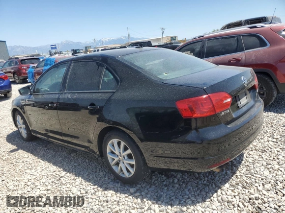 2012 Volkswagen Jetta SE with VIN 3VWDX7AJ4CM418234, listed as a Copart auction lot 60942805 with 143,652 mi miles and Clean title. Bid and sale history available at DreamBid. Image 2.