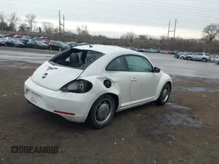 2012 Volkswagen Beetle 2.5L PZEV with VIN 3VWHP7AT9CM622739, listed as a IAAI auction lot 41674272 with 127,932 mi miles. Bid and sale history available at carsss.com. Image 4.