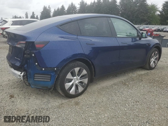 2022 Tesla Model Y Long Range z VIN 7SAYGDEE6NF429651, wystawiony jako Copart lot #57172355 z przebiegiem 19 499 mil mil oraz Szkoda całkowita • Salvage title. Historia ofert i sprzedaży dostępna na DreamBid. Obrazek 3.