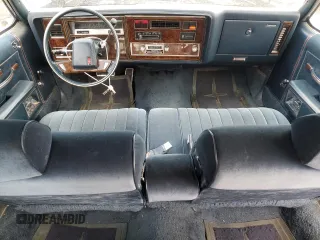 1985 Oldsmobile Delta Royale z VIN 1G3BN69YXF9080322, wystawiony jako Copart lot #78670094 z przebiegiem 58 231 mil mil oraz Tytuł czysty. Historia ofert i sprzedaży dostępna na DreamBid. Obrazek 8.