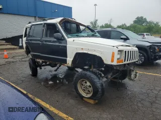 2001 Jeep Cherokee Sport with VIN 1J4FF48S41L611052, listed as a Copart auction lot 59667135 with 270,448 mi miles and Clean title. Bid and sale history available at DreamBid. Image 4.