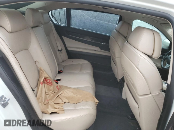 2012 BMW 7 Series 750Li xDrive z VIN WBAKC8C54CC434833, wystawiony jako Copart lot #69899284 z przebiegiem 110 959 mil mil oraz Szkoda całkowita • Salvage title. Historia ofert i sprzedaży dostępna na DreamBid. Obrazek 10.