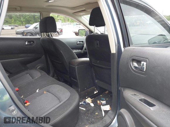 2013 Nissan Rogue S with VIN JN8AS5MV6DW628699, listed as a IAAI auction lot 42238159 with 239,632 mi miles and . Bid and sale history available at DreamBid. Image 8.
