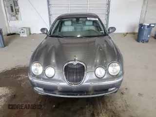 2003 Jaguar S-Type z VIN SAJEA01U93HM88490, wystawiony jako Copart lot #55721795 z przebiegiem 192 773 mil mil oraz Tytuł czysty. Historia ofert i sprzedaży dostępna na DreamBid. Obrazek 5.