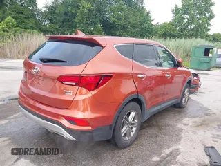 2017 Hyundai Santa Fe 2.4L z VIN 5XYZTDLB6HG451345, wystawiony jako IAAI lot #42665264 z przebiegiem 129 855 mil mil oraz . Historia ofert i sprzedaży dostępna na DreamBid. Obrazek 4.