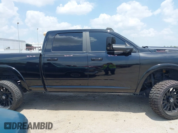 2021 Ram 2500 Laramie with VIN 3C6UR5FL7MG621346, listed as a IAAI auction lot 42419962 with 96,647 mi miles and . Bid and sale history available at DreamBid. Image 13.