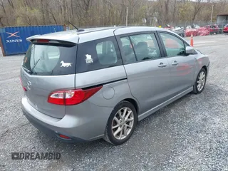 2012 Mazda 5 Touring with VIN JM1CW2CLXC0100740, listed as a IAAI auction lot 41918794 with 234,102 mi miles and . Bid and sale history available at DreamBid. Image 4.