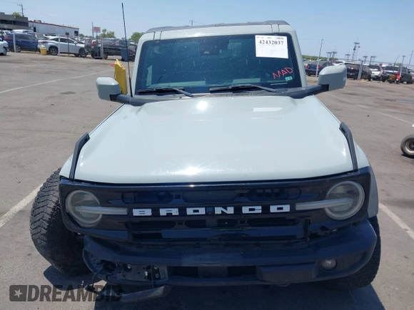 2022 Ford Bronco with VIN 1FMEE5DP6NLB34962, listed as a IAAI auction lot 42432037 with 101,044 mi miles and . Bid and sale history available at DreamBid. Image 13.