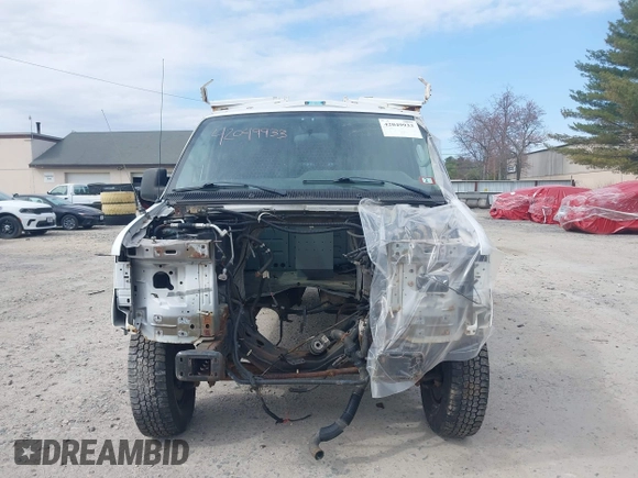 2011 Ford Econoline Cargo Commercial with VIN 1FTNE2EL0BDB36890, listed as a IAAI auction lot 42049933 with Not Provided miles. Bid and sale history available at carsss.com. Image 11.