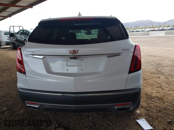 2021 Cadillac XT5 FWD Premium Luxury with VIN 1GYKNCRS5MZ224957, listed as a IAAI auction lot 41794648 with 28,540 mi miles and . Bid and sale history available at carsss.com. Image 16.