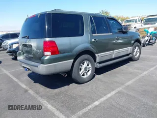 2003 Ford Expedition Special Service with VIN 1FMPU16L53LB21633, listed as a IAAI auction lot 41960271 with 196,178 mi miles. Bid and sale history available at carsss.com. Image 4.