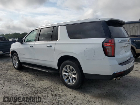 2023 Chevrolet Suburban Premier z VIN 1GNSCFKD0PR504435, wystawiony jako Copart lot #60309665 z przebiegiem 50 744 mil mil oraz Czysty tytuł • Clean title. Historia ofert i sprzedaży dostępna na DreamBid. Obrazek 2.