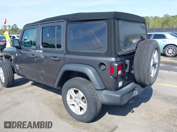 2020 Jeep Wrangler Unlimited Sport Altitude with VIN 1C4HJXDG7LW215344, listed as a IAAI auction lot 41924460 with 51,802 mi miles and . Bid and sale history available at DreamBid. Image 3.