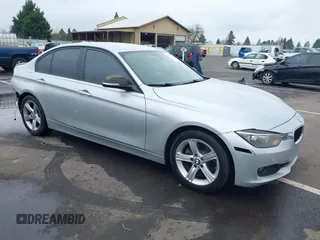 2013 BMW 3 Series 328i with VIN WBA3C1C51DF438981, listed as a IAAI auction lot 41741049 with 135,499 mi miles. Bid and sale history available at carsss.com. Image 1.