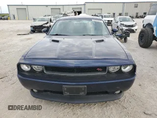 2013 Dodge Challenger R/T z VIN 2C3CDYBT9DH585965, wystawiony jako Copart lot #52995875 z przebiegiem 131 456 mil mil oraz Szkoda całkowita • Salvage title. Historia ofert i sprzedaży dostępna na DreamBid. Obrazek 5.
