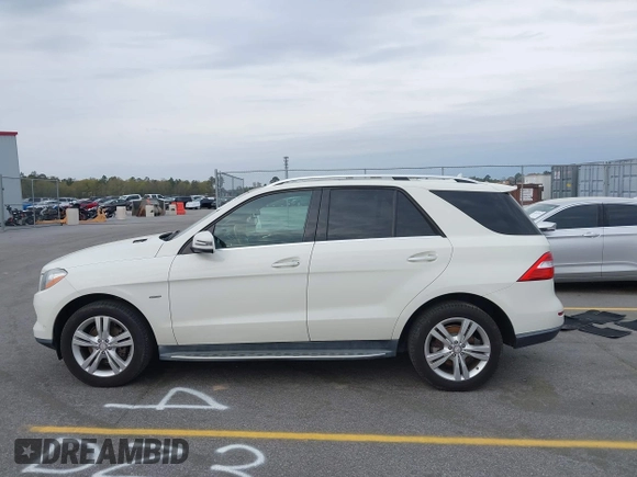 2012 Mercedes-Benz M 350 with VIN 4JGDA5HB5CA018392, listed as a IAAI auction lot 41842717 with 152,083 mi miles and . Bid and sale history available at DreamBid. Image 14.