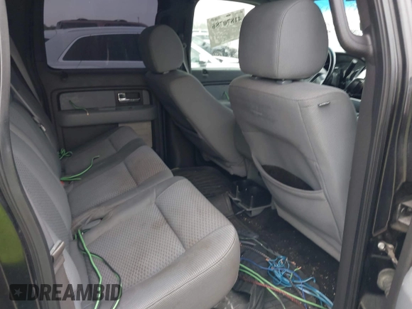 2013 Ford F-150 XL with VIN 1FTFW1CF6DKE60563, listed as a IAAI auction lot 41870786 with 194,464 mi miles and . Bid and sale history available at carsss.com. Image 8.