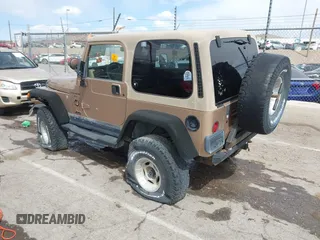 1999 Jeep Wrangler Sahara with VIN 1J4FY49S6XP437964, listed as a IAAI auction lot 41947995 with 118,566 mi miles. Bid and sale history available at carsss.com. Image 3.