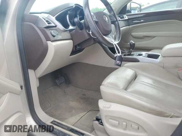 2010 Cadillac SRX Premium Collection с VIN 3GYFNCEY5AS630466, выставлен на аукционе Copart как лот 51288365 с пробегом 72 390 миль миль и Списание • Salvage title. История ставок и продаж доступна на DreamBid. Изображение 7.
