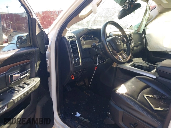 2017 Ram 1500 Laramie z VIN 1C6RR6NT4HS623048, wystawiony jako IAAI lot #41227009 z przebiegiem 124 457 mil mil oraz . Historia ofert i sprzedaży dostępna na DreamBid. Obrazek 5.