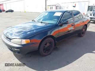 1996 Toyota Camry LE with VIN 4T1BF12K2TU863175, listed as a IAAI auction lot 42020895 with 245,443 mi miles and . Bid and sale history available at DreamBid. Image 2.